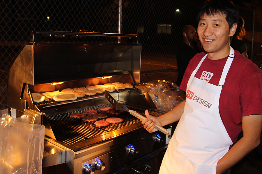 Kuan takes a break from grilling for a picture.